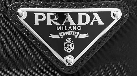 prada triangle logo history|designer bag with triangle logo.